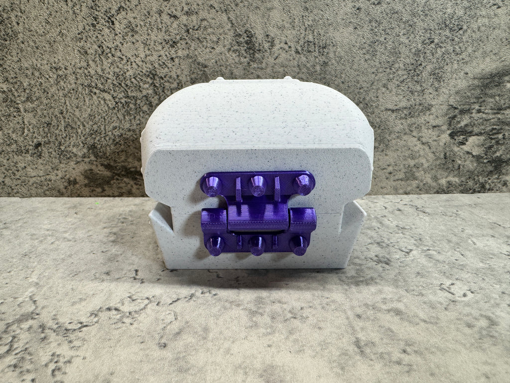 a close up of a purple object on a table