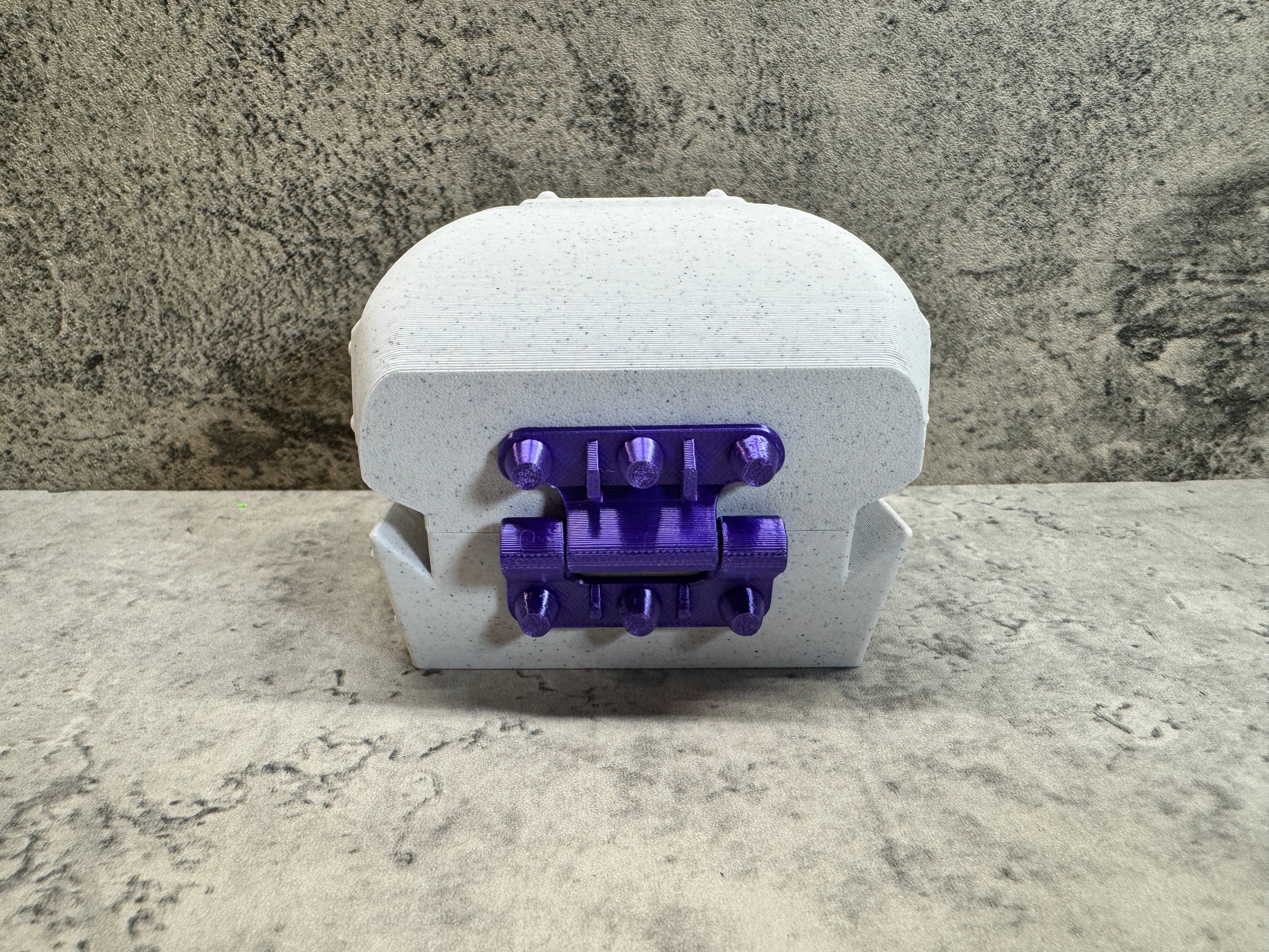 a close up of a purple object on a table