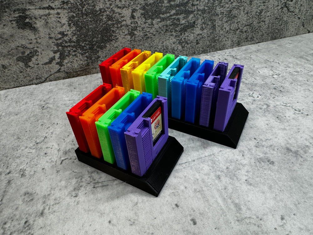 
                  
                    a group of colorful folders sitting on top of a table
                  
                