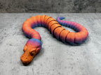 a toy of a worm on a table