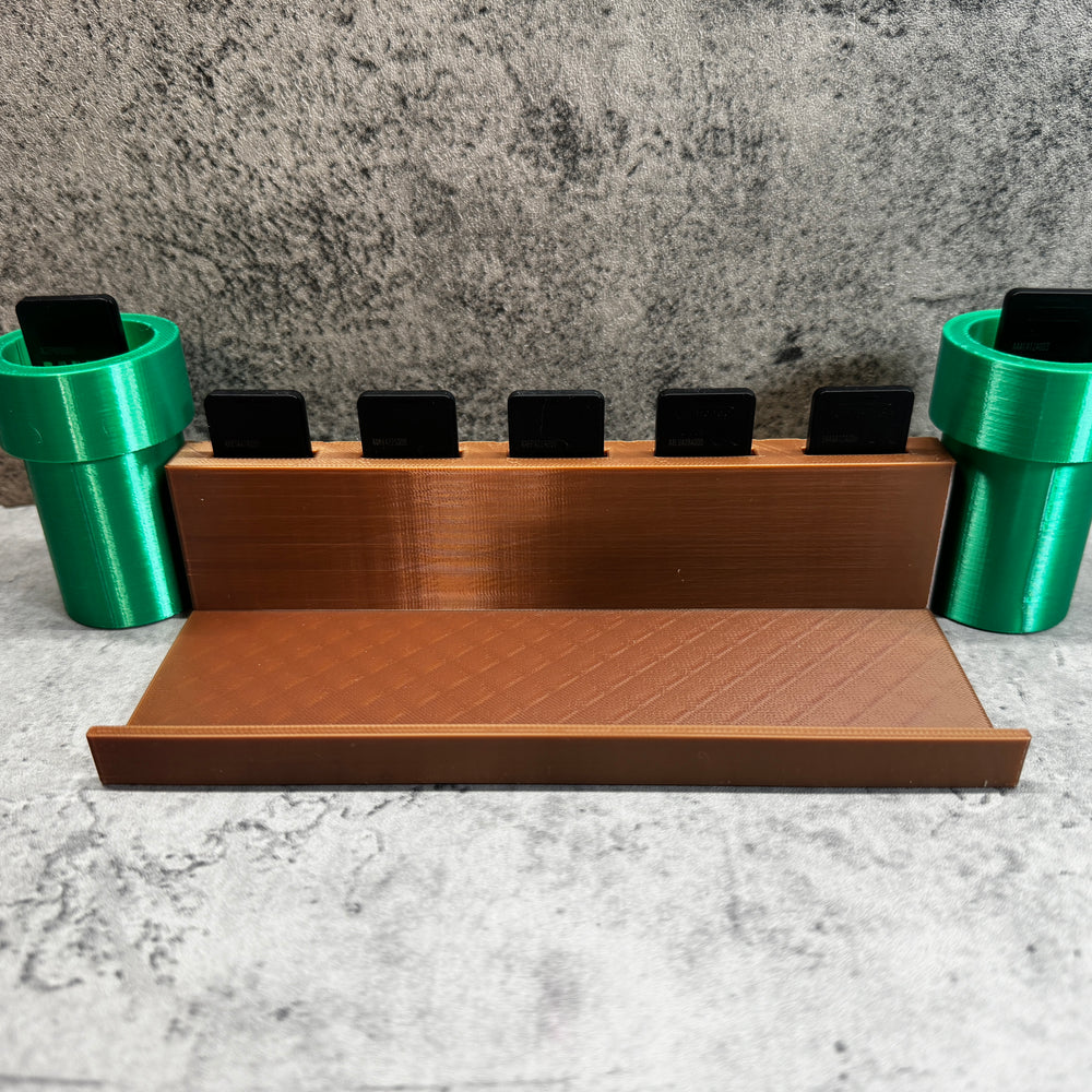 
                  
                    a set of three green cups sitting on top of a counter
                  
                