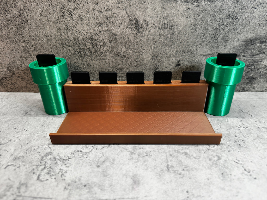 a set of three green cups sitting on top of a counter