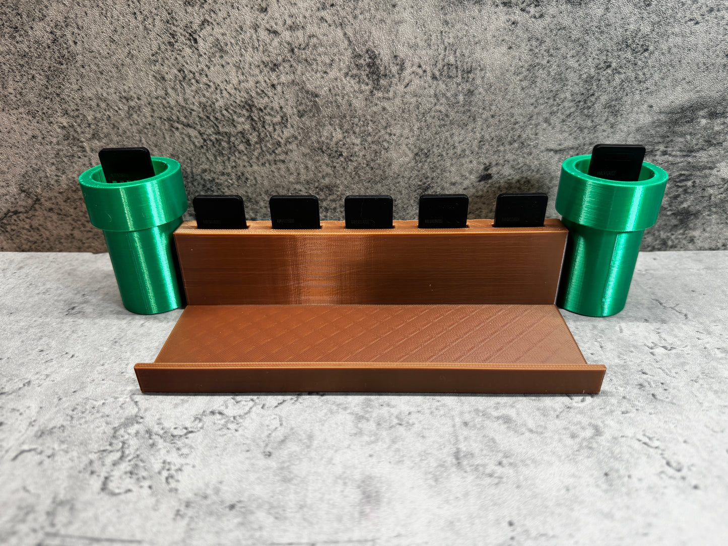 
                  
                    a set of three green cups sitting on top of a counter
                  
                