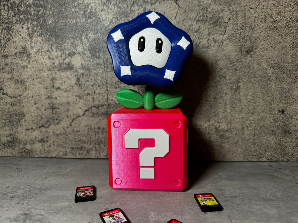 a toy with a question mark on top of it