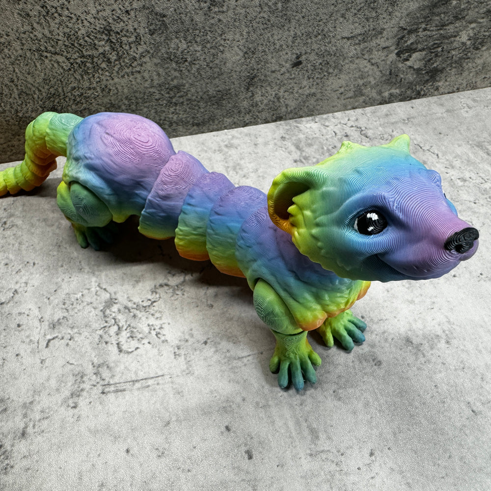 
                  
                    a toy lizard is sitting on the floor
                  
                