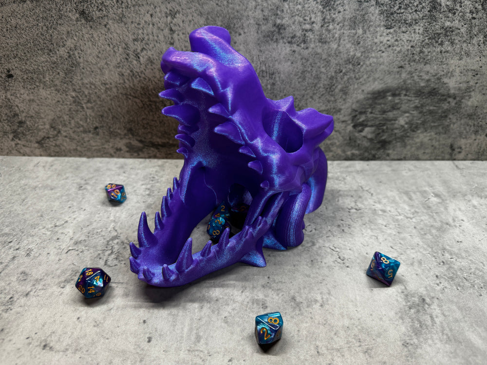 
                  
                    a purple dragon&#39;s head surrounded by dice
                  
                