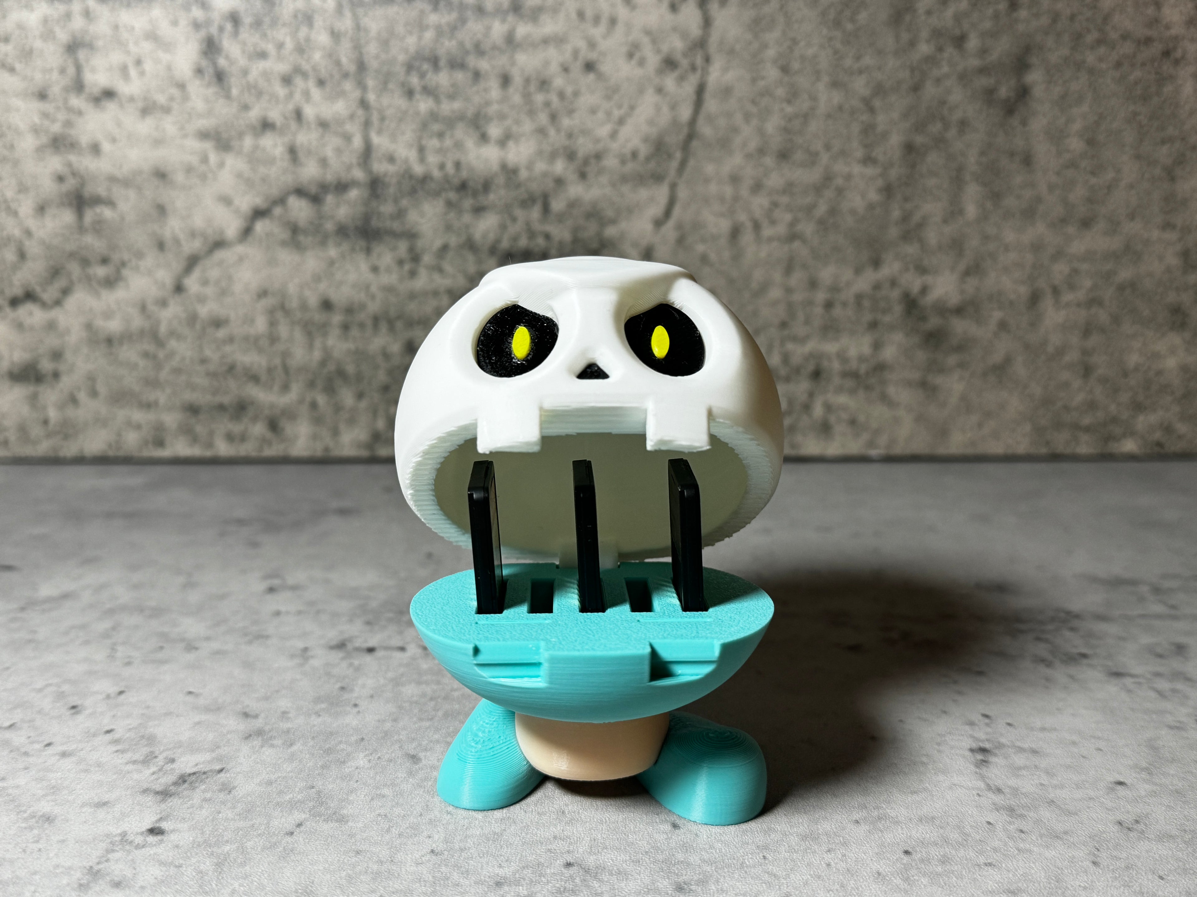 a toy with a toothbrush in it's mouth