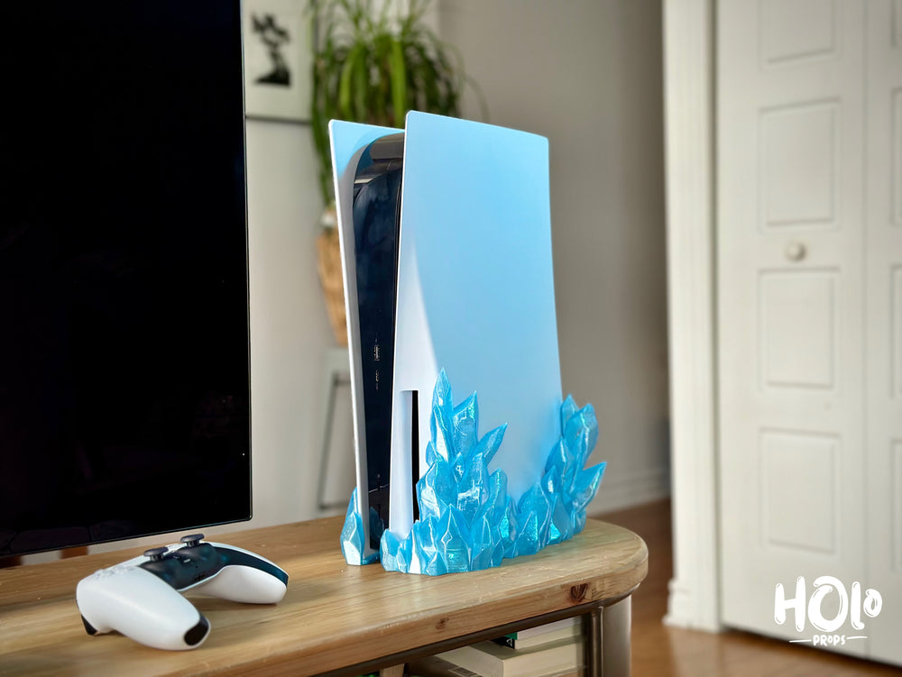 
                  
                    a desk with a computer and a game controller on it
                  
                