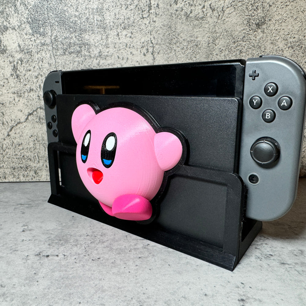 
                  
                    a nintendo wii game controller with a pink pig head
                  
                