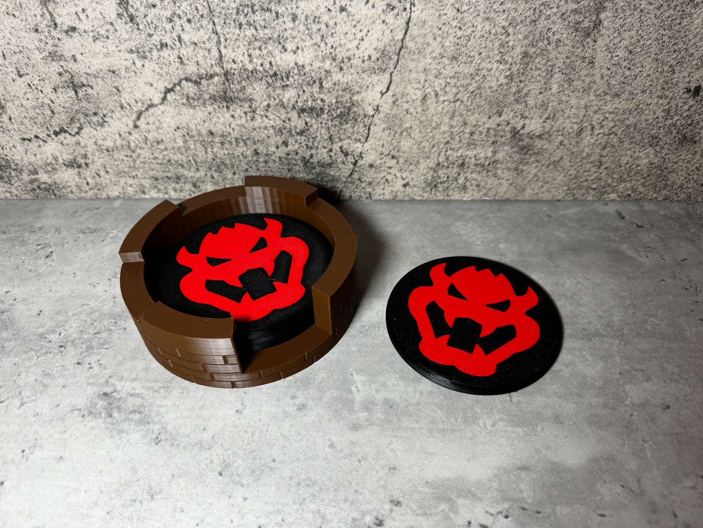 
                  
                    a couple of plates sitting on top of a cement floor
                  
                