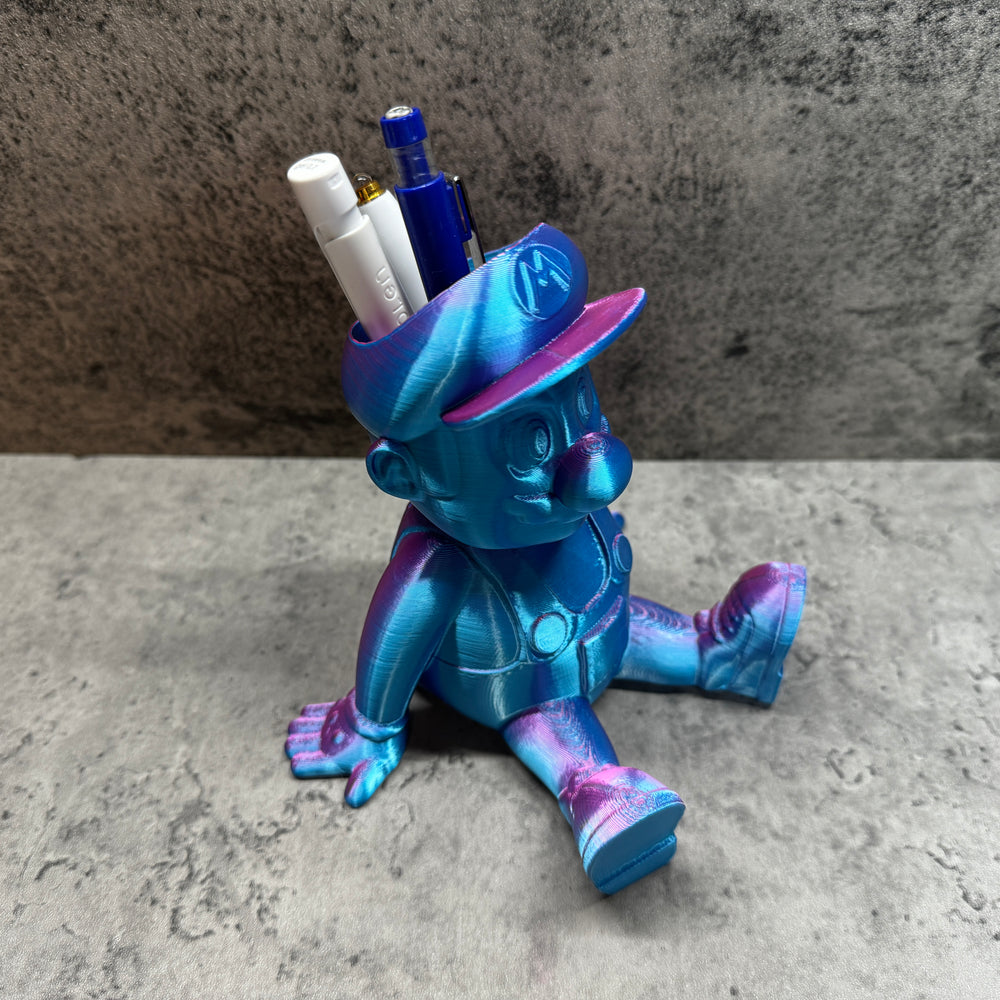 
                  
                    a blue and purple toy sitting on top of a table
                  
                