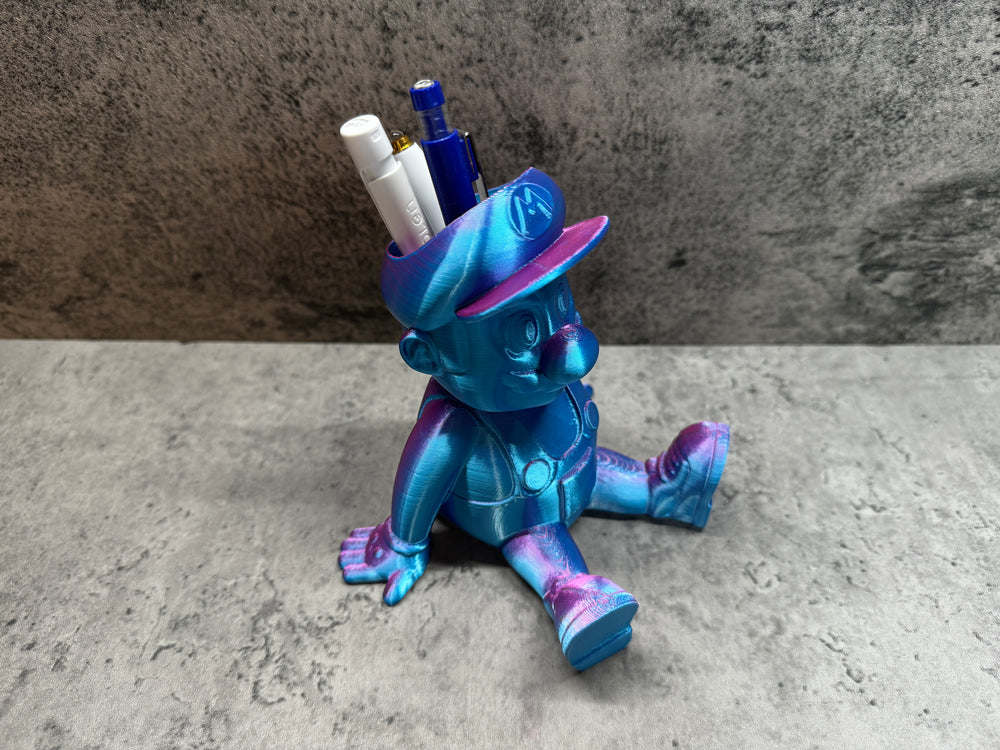 
                  
                    a blue and purple toy sitting on top of a table
                  
                