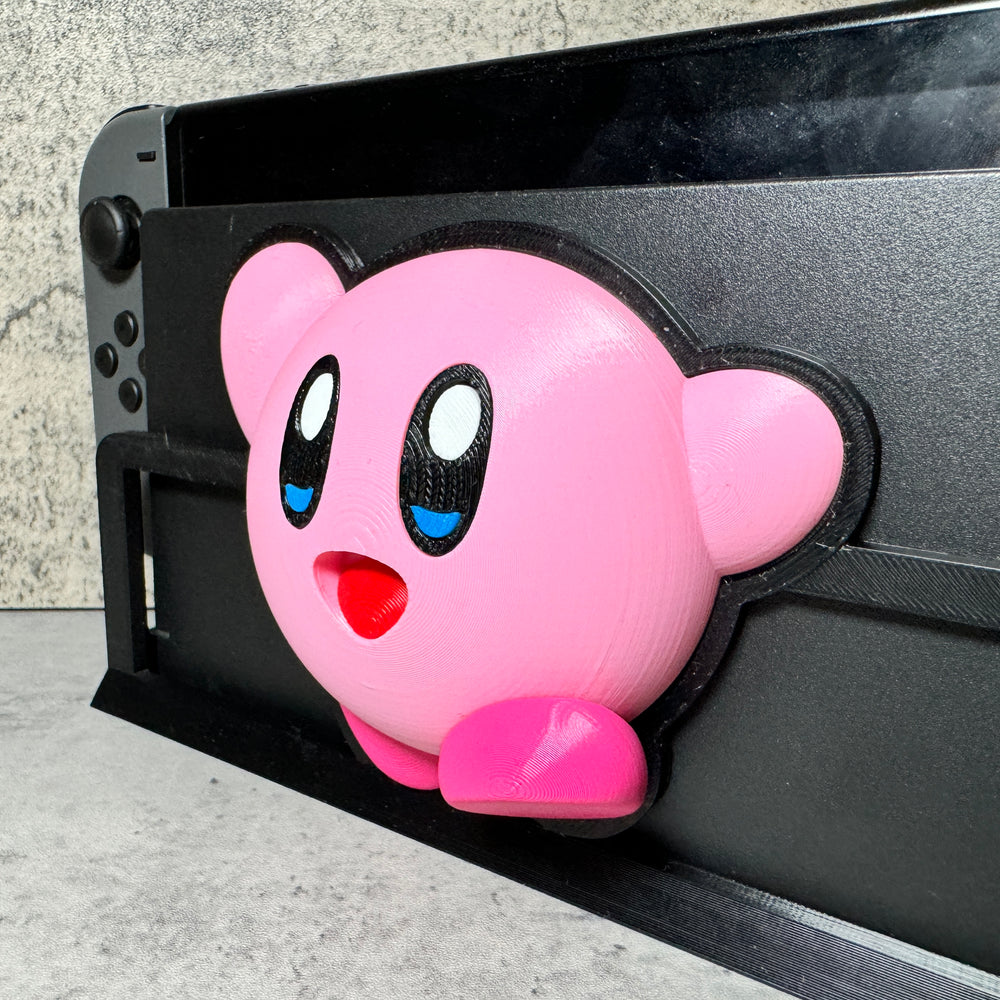 a pink toy pig sticking out of the side of a tv