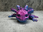 a close up of a toy animal on a table
