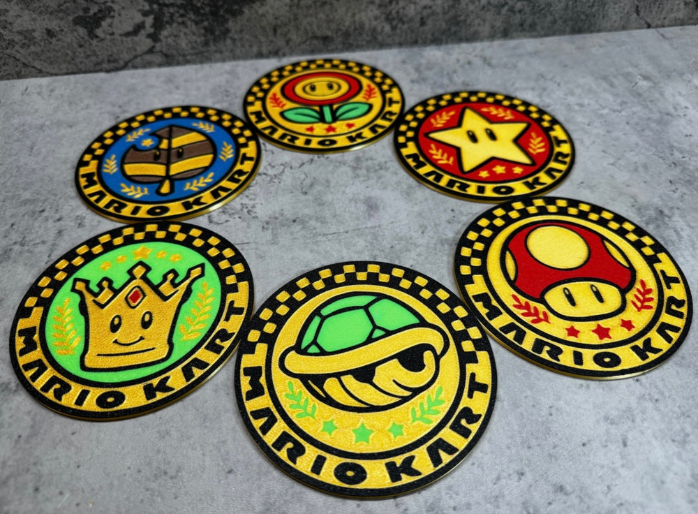 
                  
                    a set of six nintendo coasters sitting on top of a table
                  
                
