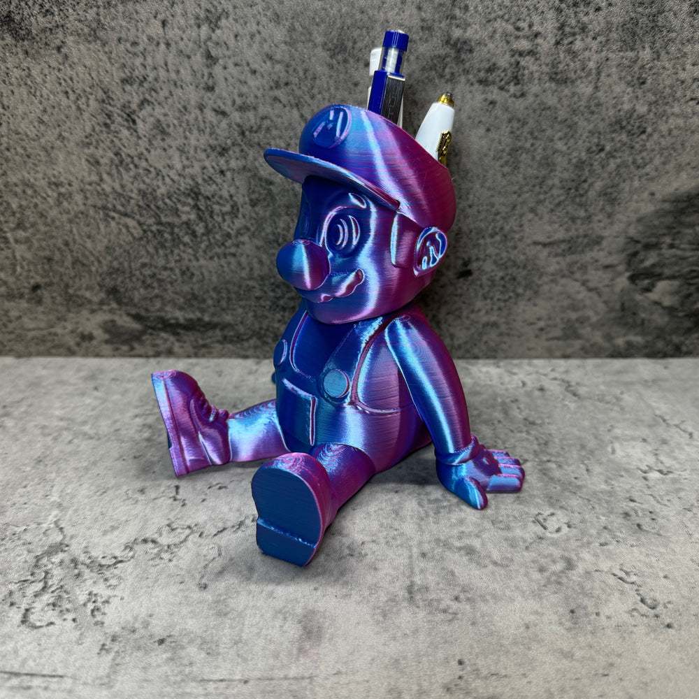 
                  
                    a purple and blue toy sitting on top of a table
                  
                