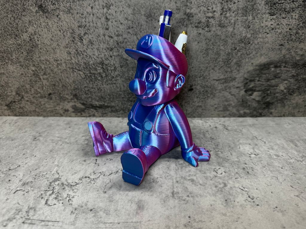 a purple and blue toy sitting on top of a table