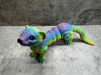 a toy animal that looks like a lizard