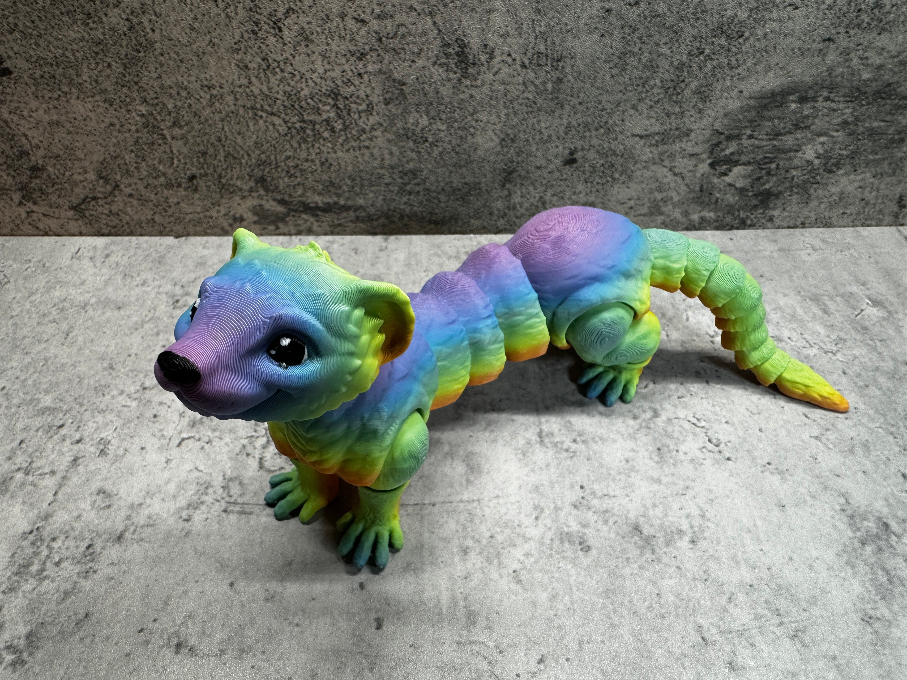 a toy animal that looks like a lizard
