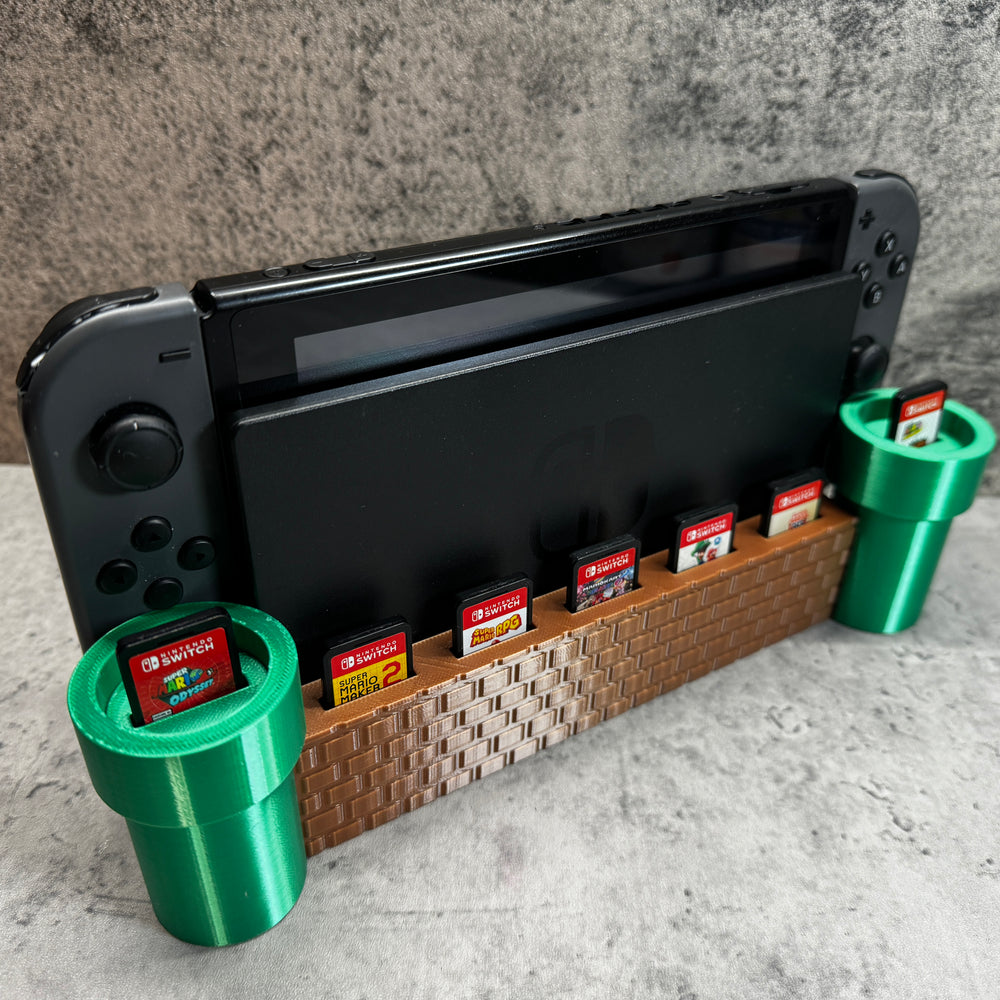 
                  
                    a nintendo wii game system sitting on top of a shelf
                  
                