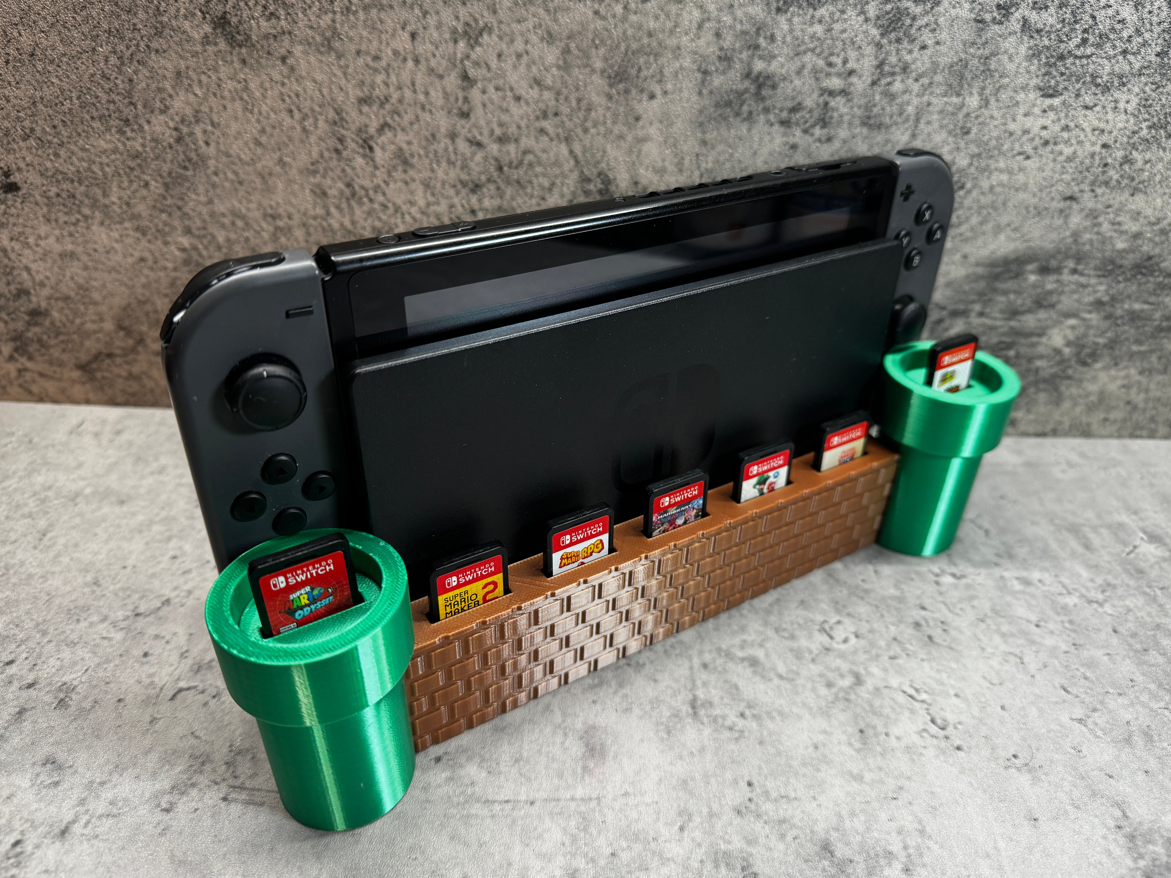 a nintendo wii game system sitting on top of a shelf