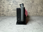 a cell phone that is sitting on a stand