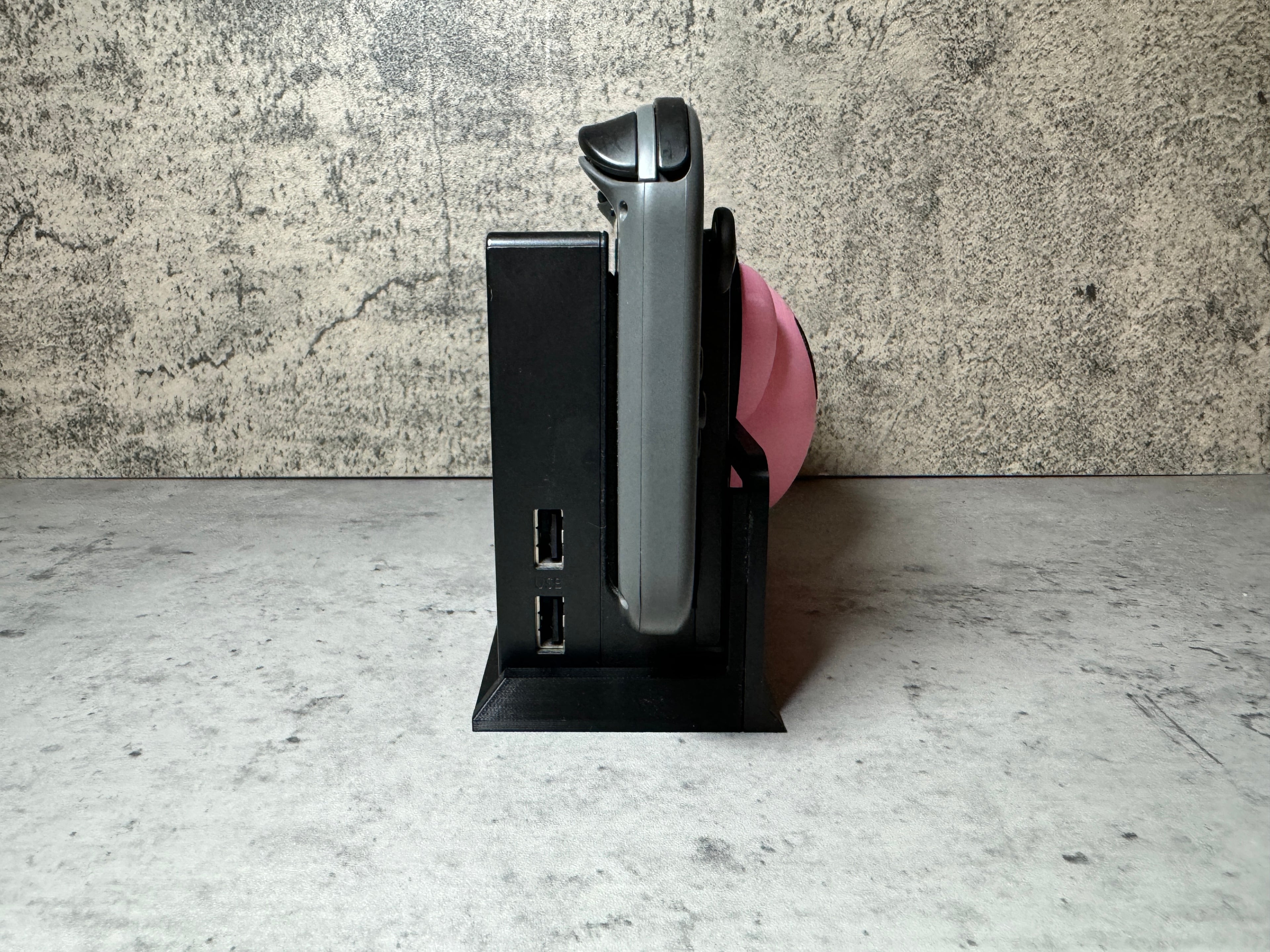 a cell phone that is sitting on a stand