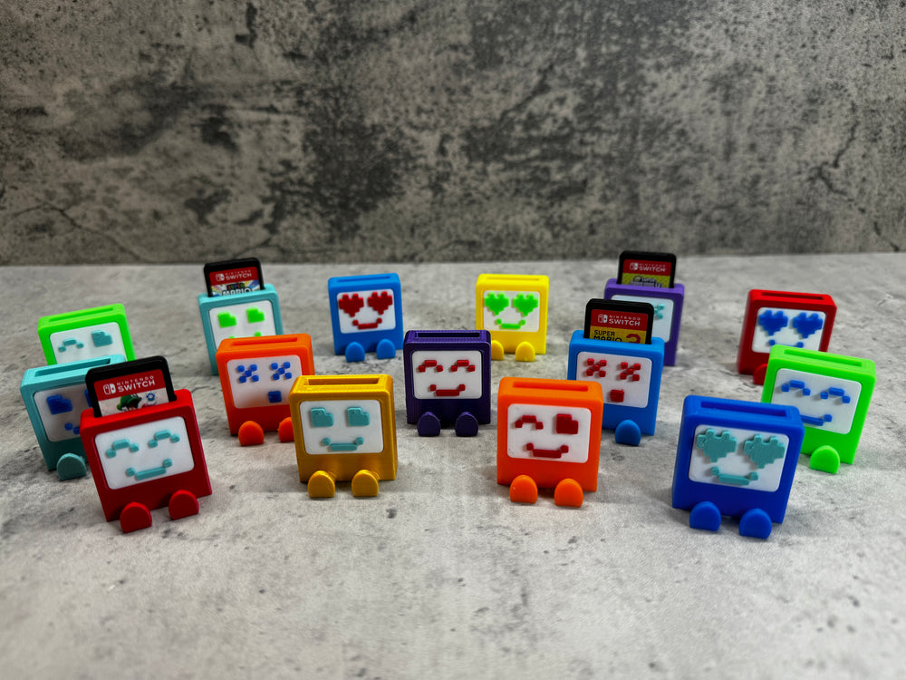 a group of small toy trains sitting on top of a table