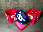 a couple of toys sitting on top of a table