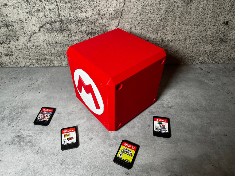 
                  
                    a red box with five different games on it
                  
                
