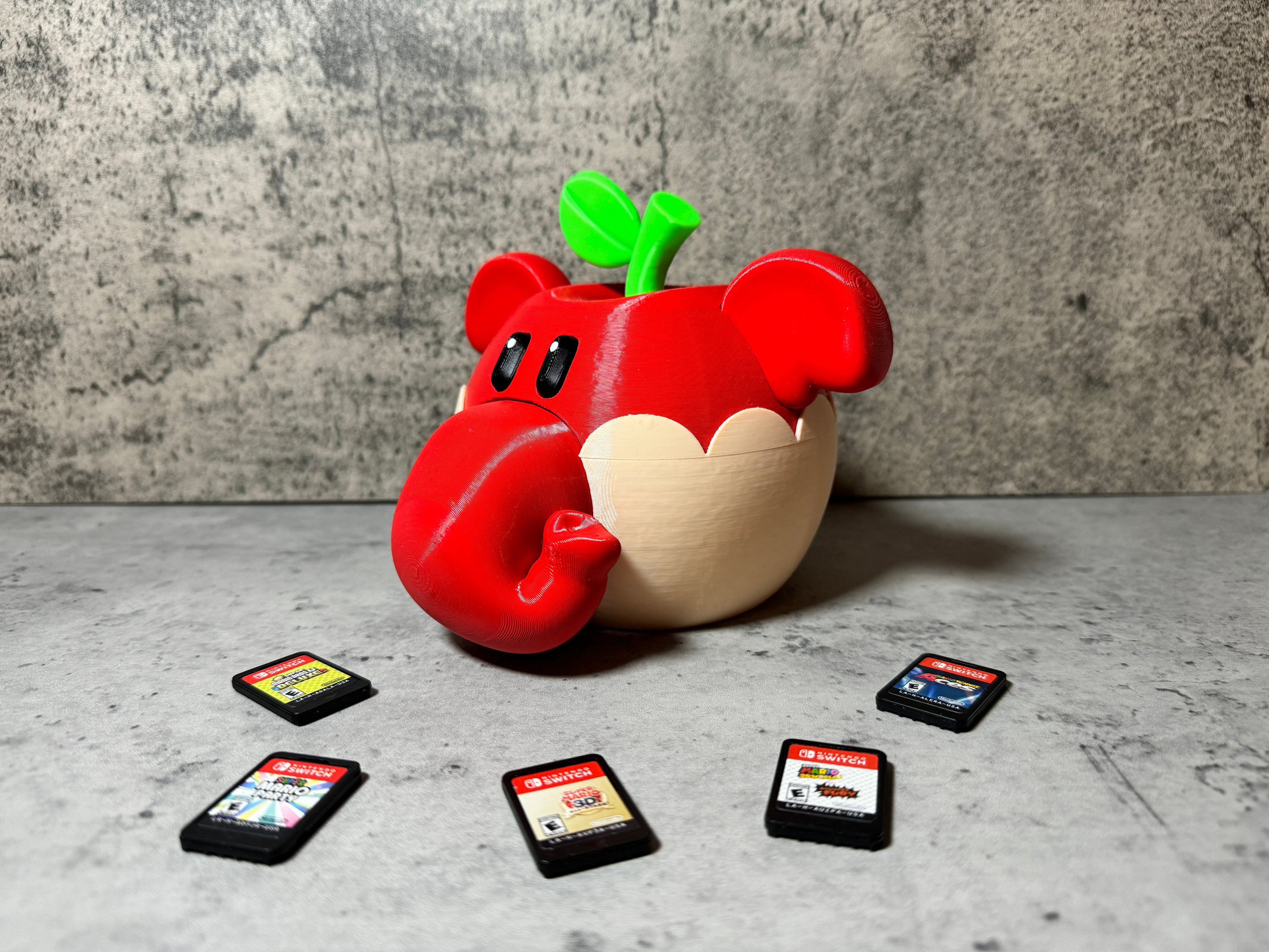 a red apple with a green leaf on top of it surrounded by cell phones
