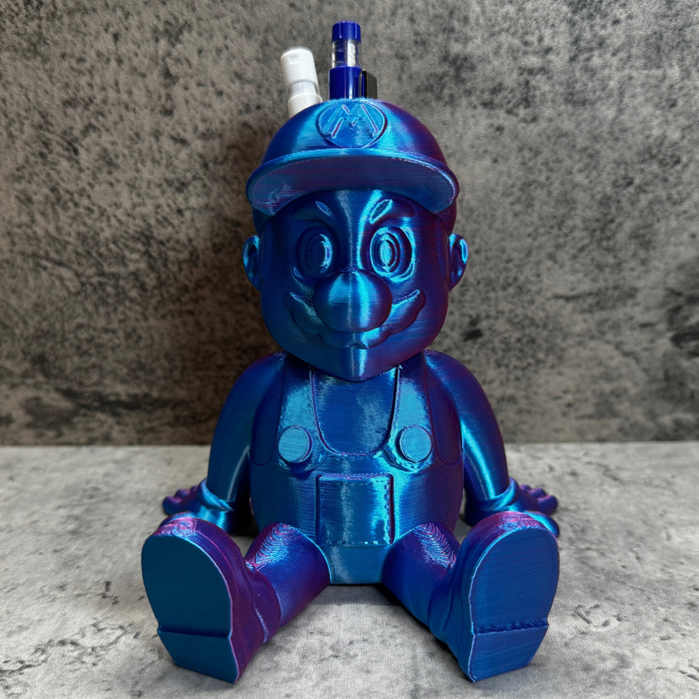 a blue and purple toy sitting on top of a table