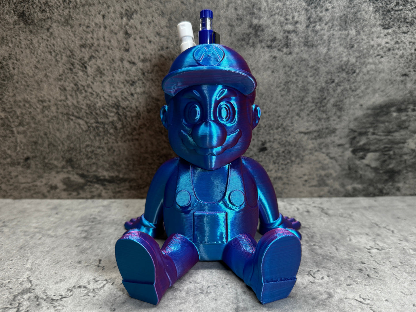 a blue and purple toy sitting on top of a table