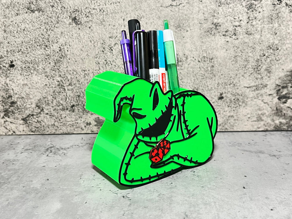 
                  
                    Green Ghoul with Dice Pen Holder
                  
                