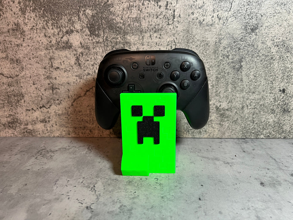 
                  
                    Video Game Controller Stand - Green Guy
                  
                