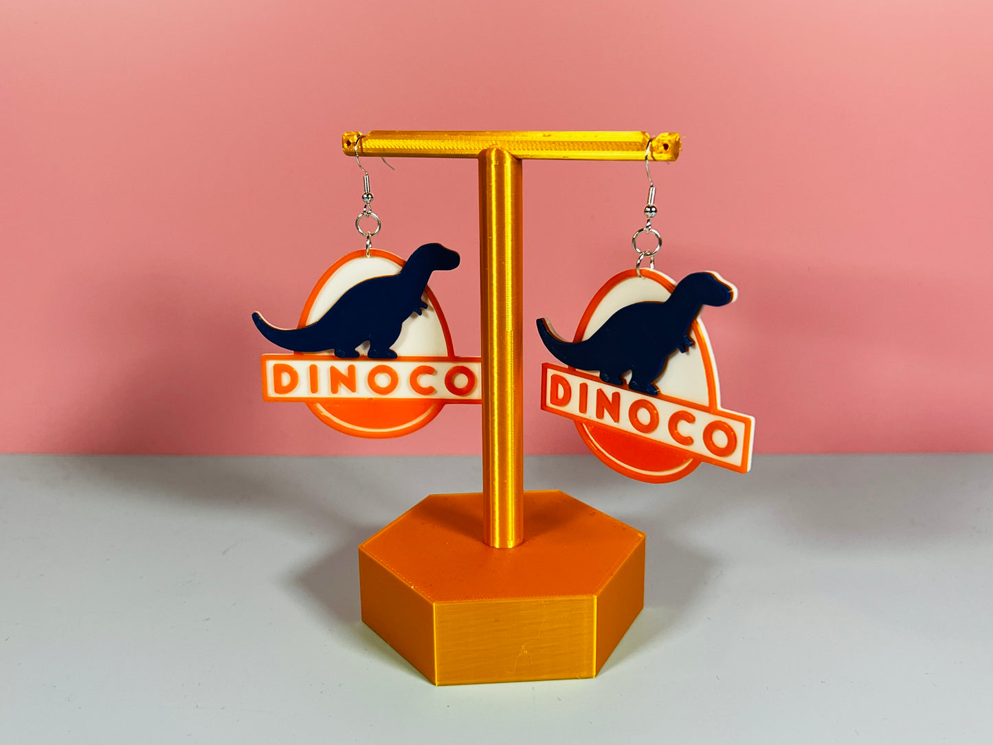
                  
                    Dinoco Earrings
                  
                
