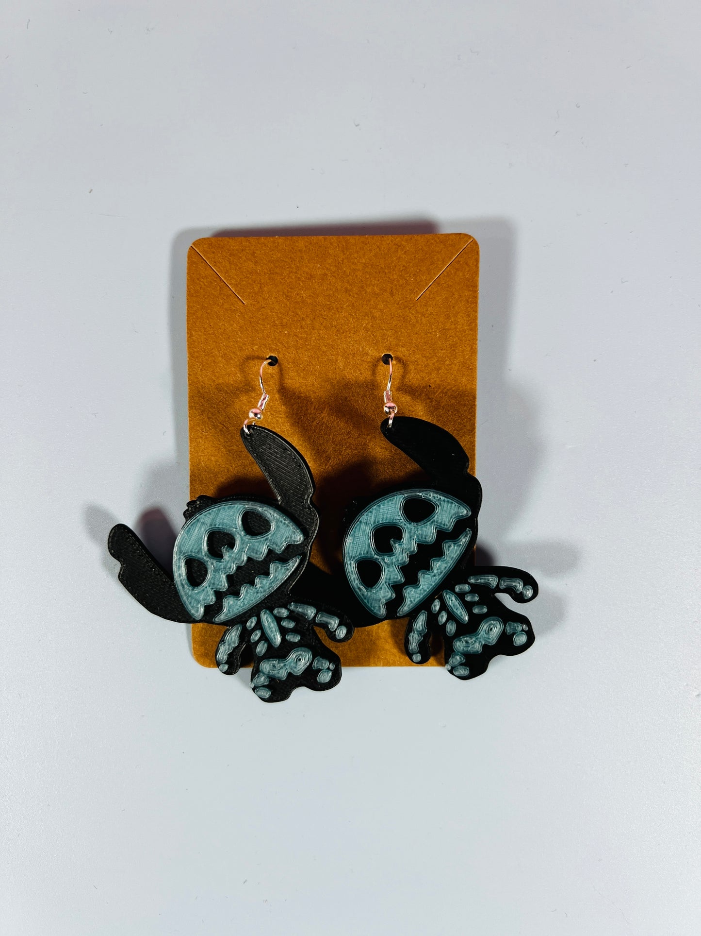 
                  
                    Blue Skeleton Alien Earrings
                  
                